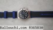 Montre Swatch bleue et noire