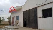 korba ; 2 hectares et 7000m² avec deux maisons sur le goudronne a 320mdt