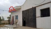: korba ; 2 hectares et 7000m² avec deux maisons sur le goudronne a 320mdt