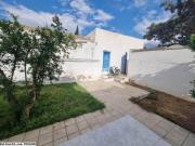 tres jolie maisonnette avec garage a vendre