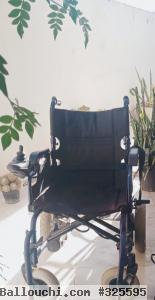 A VENDRE CHAISE ROULLANTE