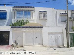 Duplex avec un studio et 2 garages