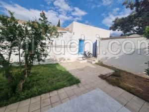 tres jolie maisonnette avec garage a vendre
